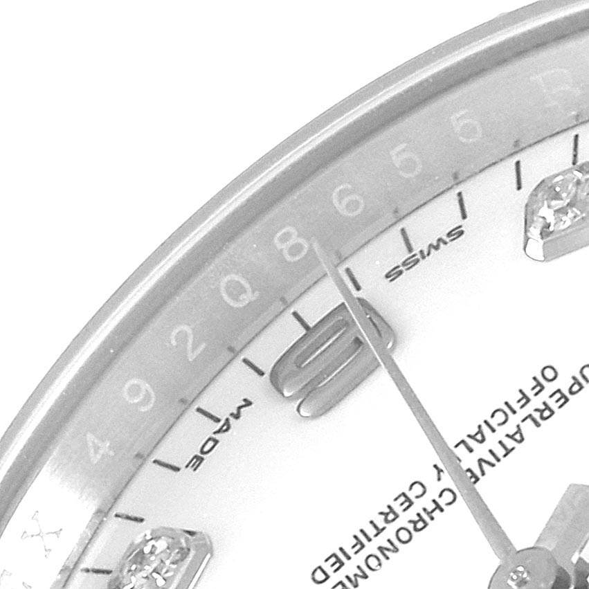 Close-up of the dial showing details of the Rolex Date 115234 Men's Stainless Steel White Dial 115234 Men's Stainless Steel White Dial watch model, including hour markers and a portion of the bezel.