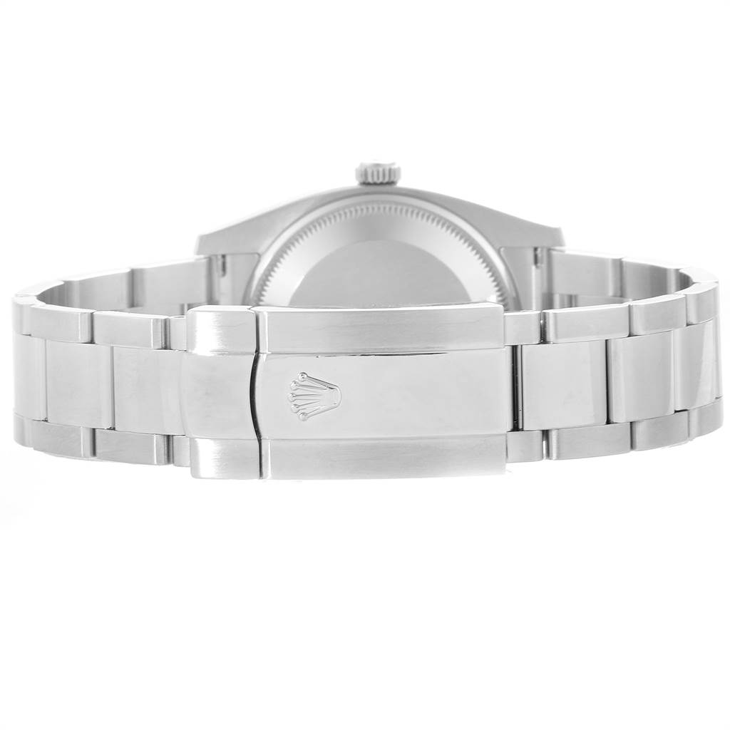 The image shows the back view of the Rolex Date 115234 Men's Stainless Steel White Dial 115234 Men's Stainless Steel White Dial model watch, focusing on the clasp and bracelet.
