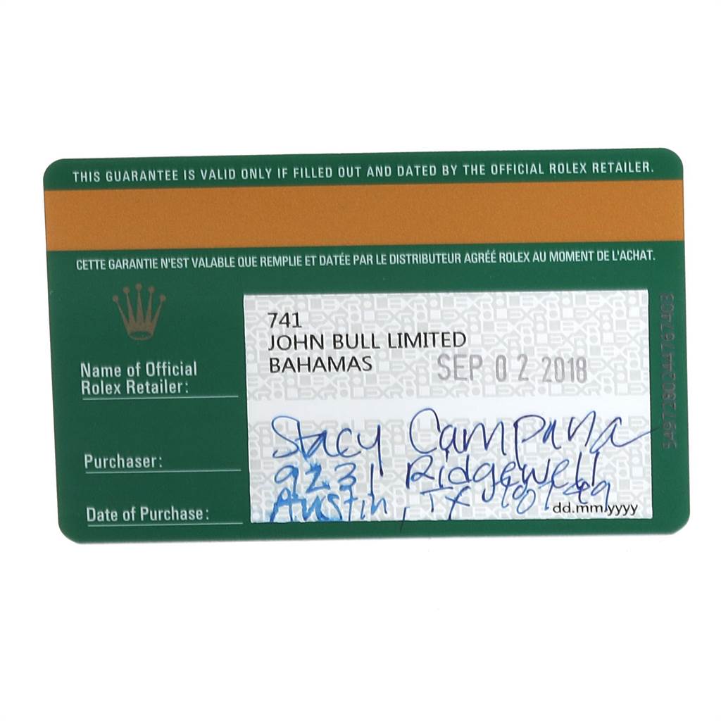This image shows the warranty card for a Rolex Date 115234 Men's Stainless Steel White Dial 115234 Men's Stainless Steel White Dial model, displaying retailer details and purchase date.