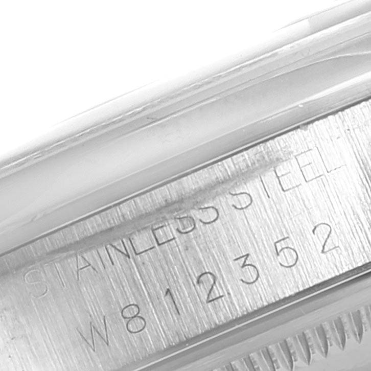 This close-up image shows the stainless steel part and serial number of a Rolex Date 15200 Men's Stainless Steel Pink Dial 15200 Men's Stainless Steel Pink Dial model watch.
