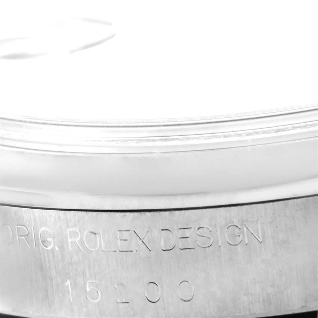 The close-up image shows the engraved bezel of a Rolex Date 15200 Men's Stainless Steel Pink Dial 15200 Men's Stainless Steel Pink Dial model watch.