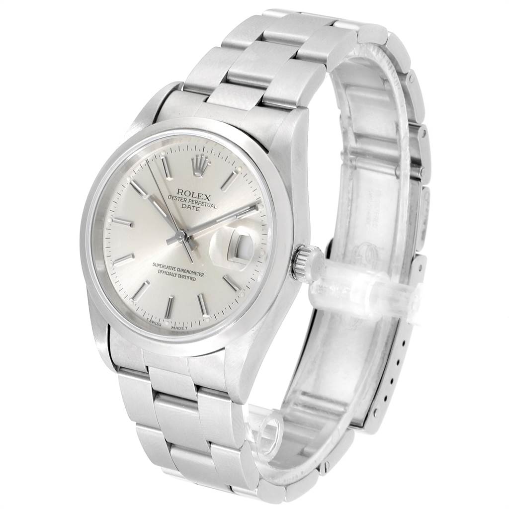 This image shows the front and part of the bracelet of a Rolex Oyster Perpetual Date watch, taken at an oblique angle.