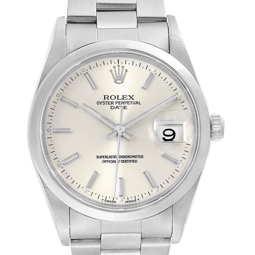 The image shows a front view of a Rolex Oyster Perpetual Date watch face and part of the bracelet.