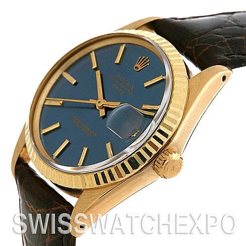 The image shows a side angle of a Rolex Date 1503 Men's Yellow Gold Blue Dial 1503 Men's Yellow Gold Blue Dial model watch, highlighting its blue dial, gold fluted bezel, and leather strap.
