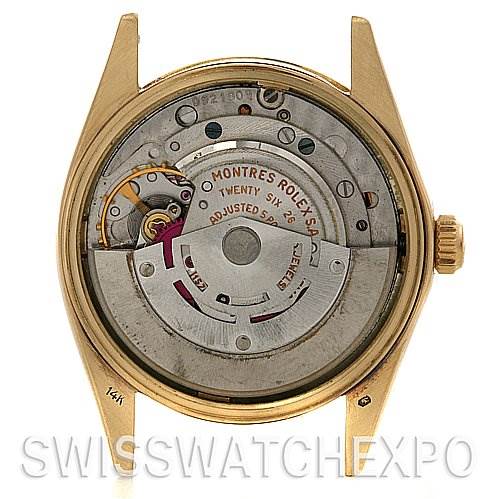 This image shows the back view of a Rolex Date 1503 Men's Yellow Gold Blue Dial 1503 Men's Yellow Gold Blue Dial model watch, highlighting the internal mechanical movement.