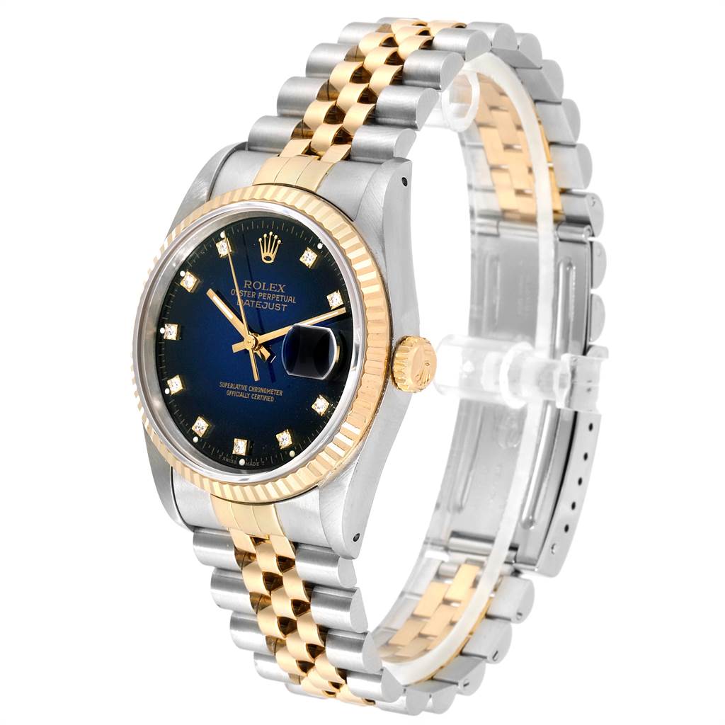 The Rolex Date 16233 Men's Steel and Gold (two tone) Blue Dial 16233 Men's Steel and Gold (two tone) Blue Dial model watch is shown at a slight side angle, displaying its face, bezel, and bracelet.
