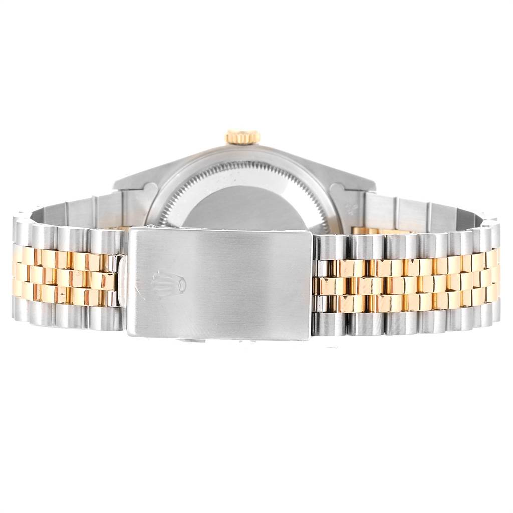 This image shows the back of a Rolex Date 16233 Men's Steel and Gold (two tone) Blue Dial 16233 Men's Steel and Gold (two tone) Blue Dial model watch, highlighting its two-tone bracelet and clasp.