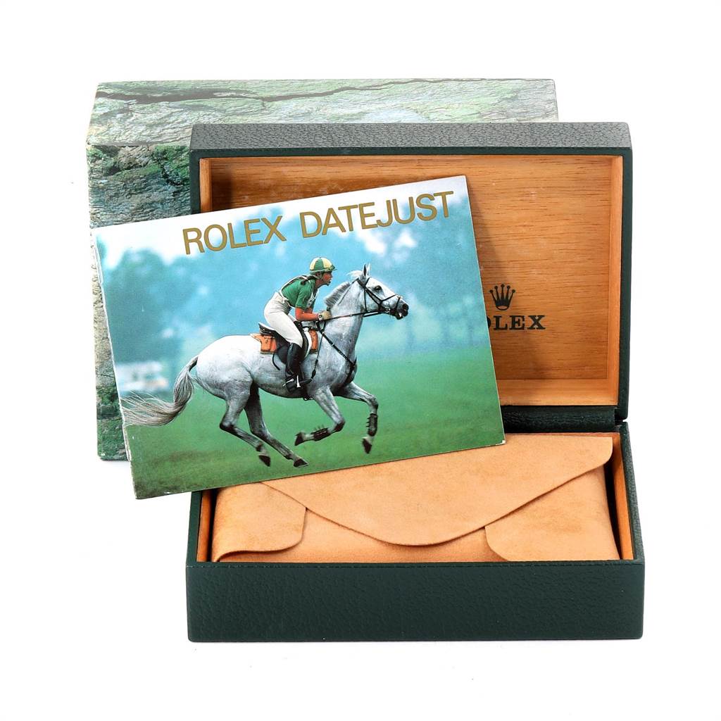 The image shows a Rolex Date 16233 Men's Steel and Gold (two tone) Blue Dial 16233 Men's Steel and Gold (two tone) Blue Dialjust box and manual, with the box partially open and a booklet featuring a polo player.