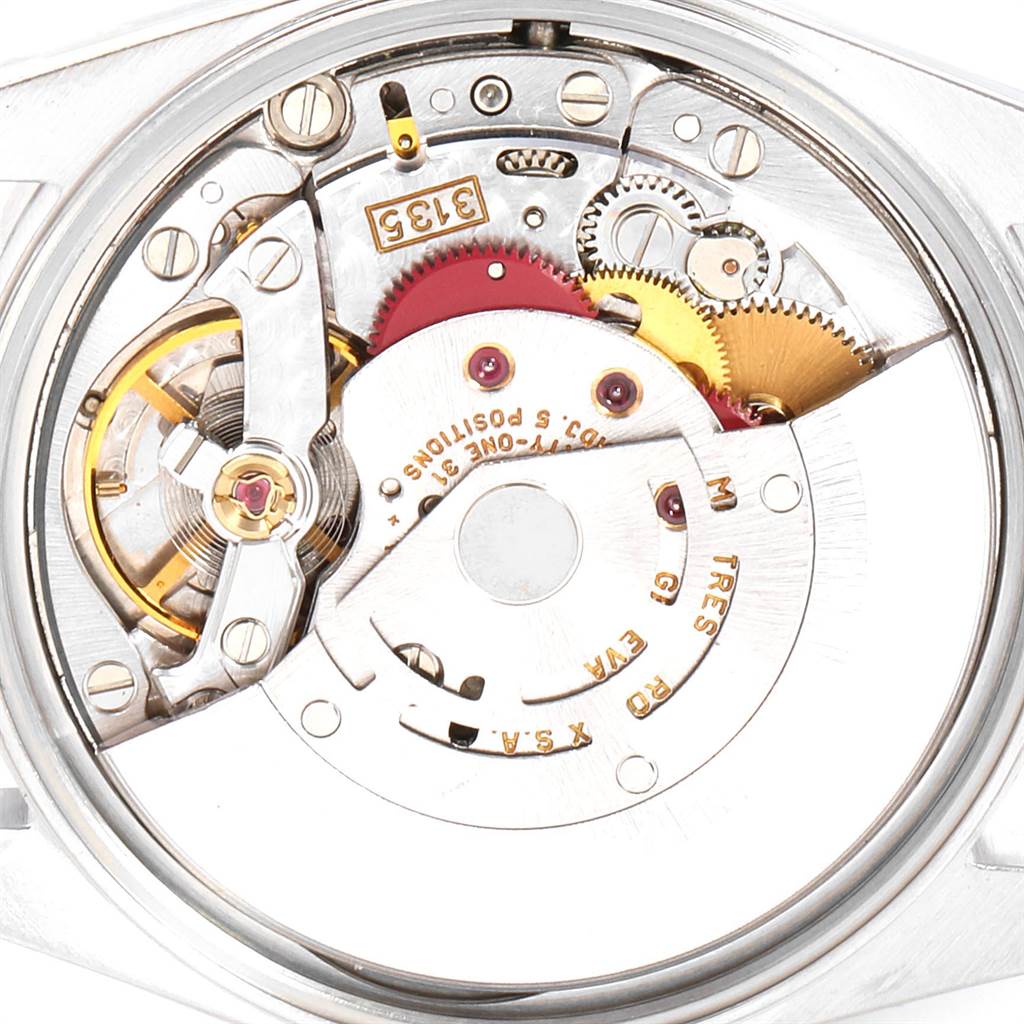 This image shows the internal mechanisms of a Rolex Date 15210 Men's Stainless Steel Black Dial 15210 Men's Stainless Steel Black Dial model watch from a top-down angle.