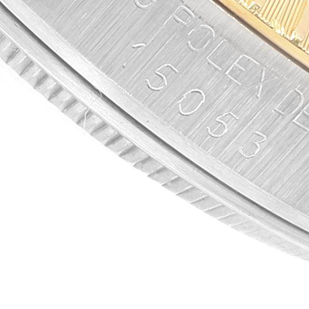 This image shows a close-up of the serial number and edge of the case of a Rolex Date 15053 Men's Steel and Gold (two tone) Silver Dial 15053 Men's Steel and Gold (two tone) Silver Dial watch.