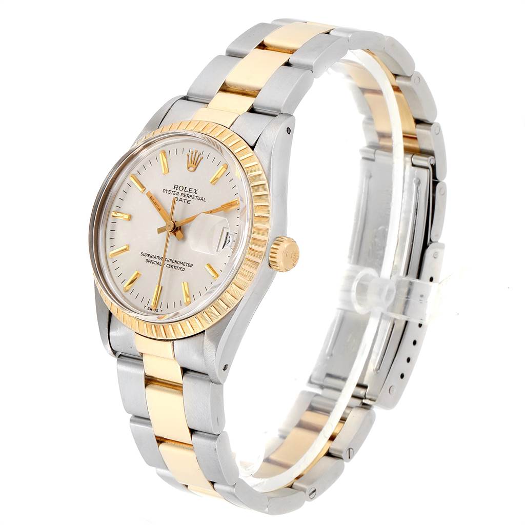 The image shows a side view of a Rolex Date 15053 Men's Steel and Gold (two tone) Silver Dial 15053 Men's Steel and Gold (two tone) Silver Dial model, showcasing its gold and silver bracelet, bezel, dial, and crown.