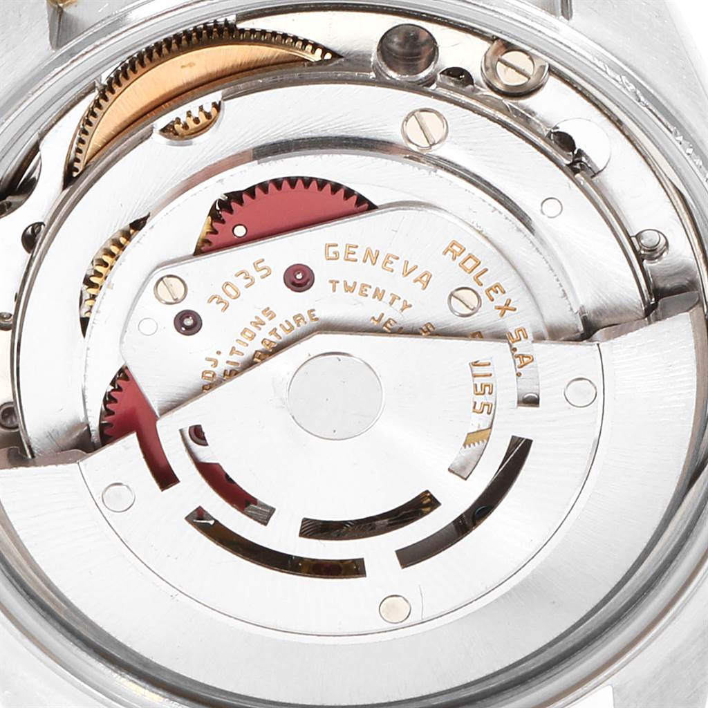 The image shows a close-up of the movement and inner mechanisms of a Rolex Date 15053 Men's Steel and Gold (two tone) Silver Dial 15053 Men's Steel and Gold (two tone) Silver Dial model watch.