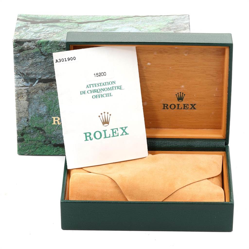 The image shows a Rolex Date 15200 Men's Stainless Steel Blue Dial 15200 Men's Stainless Steel Blue Dial model box, an official chronometer certification paper, and a suede pouch from a frontal angle.