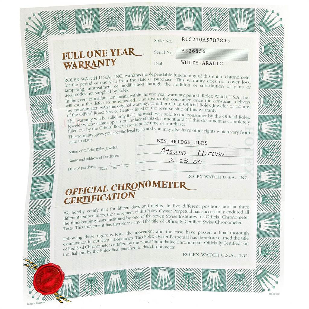 The image shows a full one-year warranty and official chronometer certification for a Rolex Date 15210 Men's Stainless Steel White Dial 15210 Men's Stainless Steel White Dial model watch.