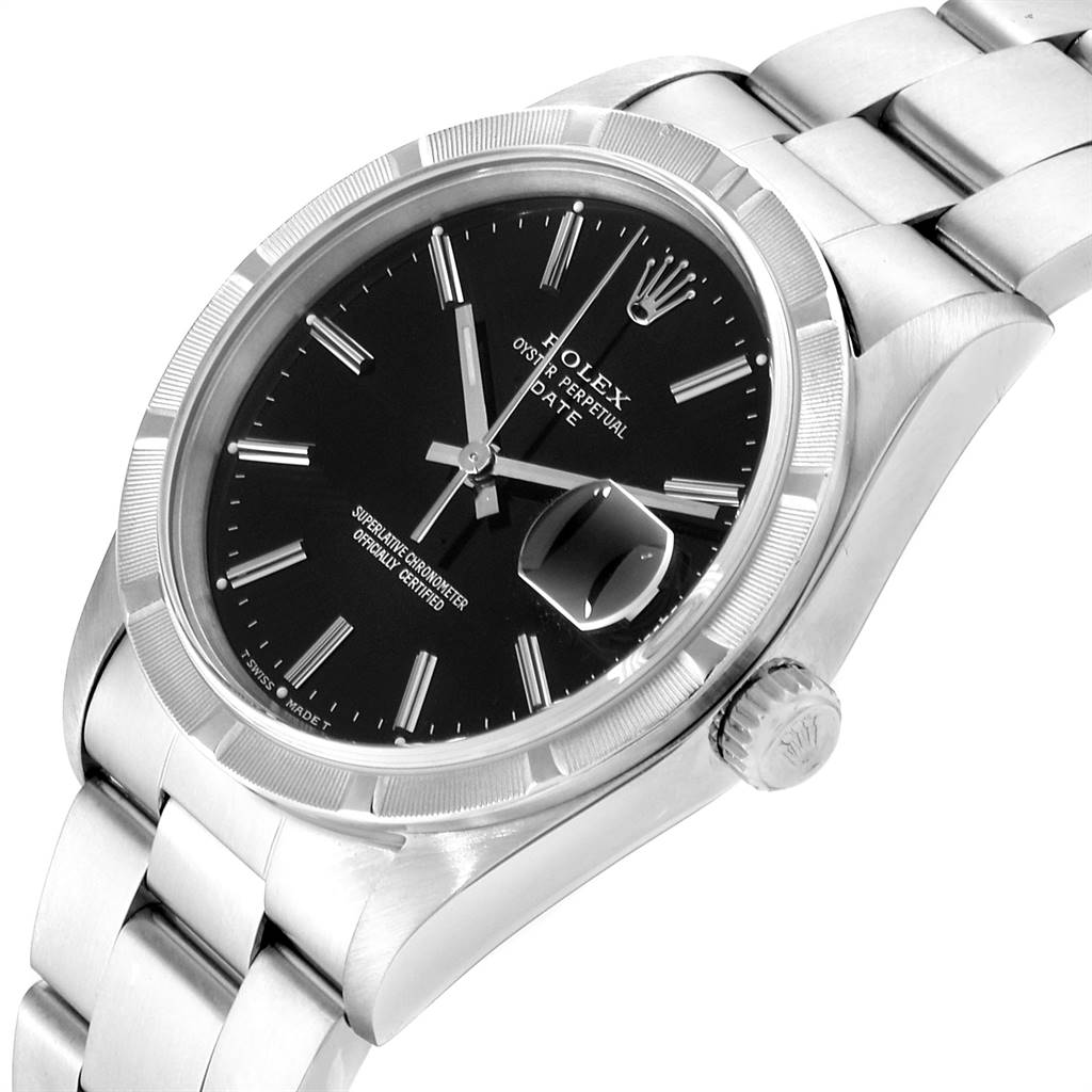 The image shows a close-up angle of the Rolex Oyster Perpetual Date watch, highlighting the face, bezel, crown, and part of the bracelet.