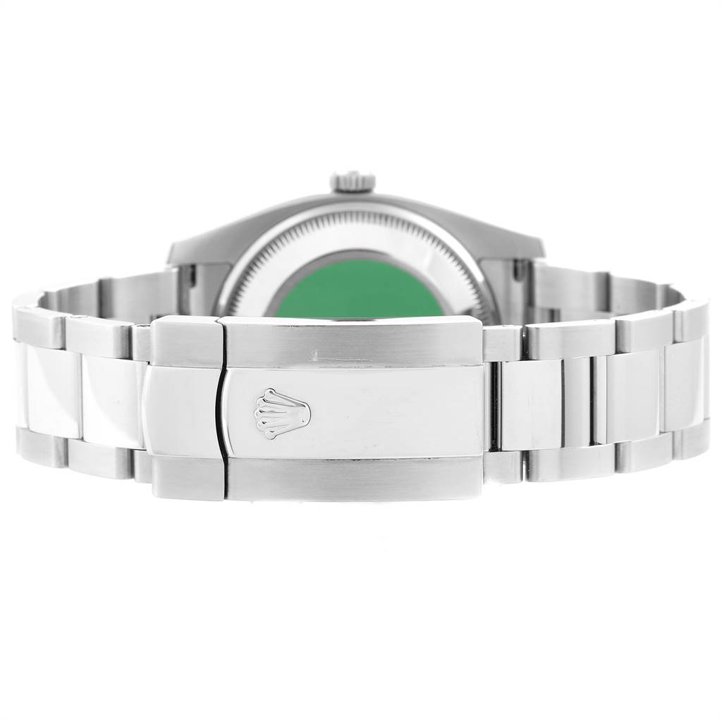 This image shows the back view of a Rolex Date 115234 Men's Stainless Steel White Dial 115234 Men's Stainless Steel White Dial watch, focusing on the clasp and bracelet.