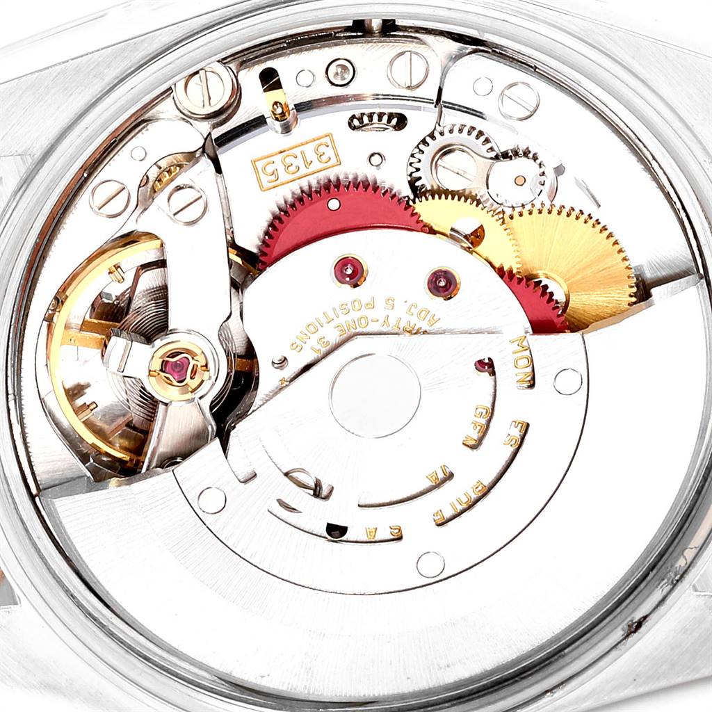 The image shows the internal mechanical parts of the Rolex Date 15223 Men's Steel and Gold (two tone) Champagne Dial 15223 Men's Steel and Gold (two tone) Champagne Dial model watch at a top-down angle.