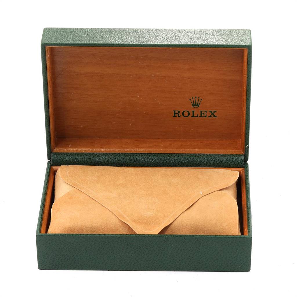 This is a Rolex Date 15223 Men's Steel and Gold (two tone) Champagne Dial 15223 Men's Steel and Gold (two tone) Champagne Dial model watch box, shown open with a suede pouch inside.