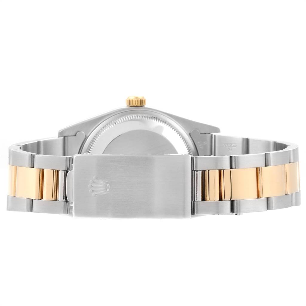 The image shows the back view of a Rolex Date 15223 Men's Steel and Gold (two tone) Champagne Dial 15223 Men's Steel and Gold (two tone) Champagne Dial model watch, focusing on the bracelet and clasp.