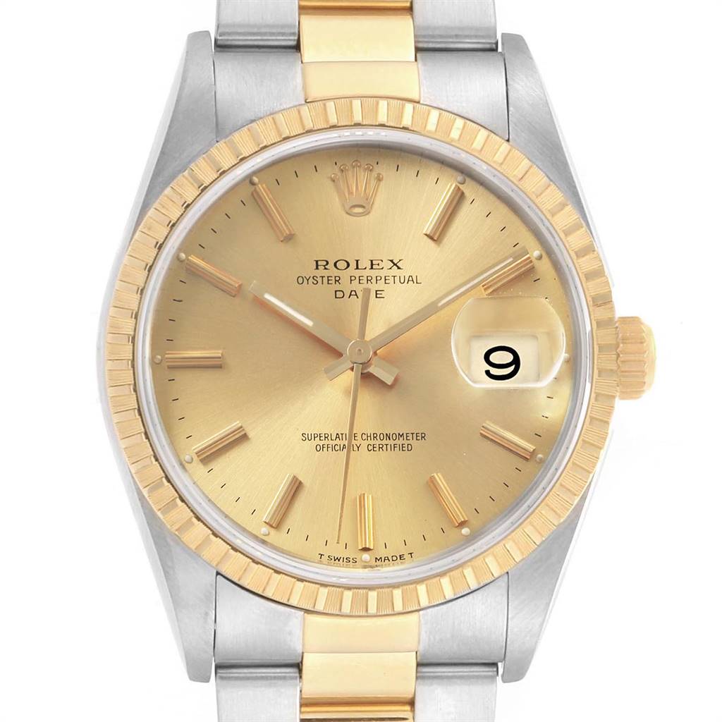 This image shows a frontal view of the Rolex Date 15223 Men's Steel and Gold (two tone) Champagne Dial 15223 Men's Steel and Gold (two tone) Champagne Dial watch, including the dial, bezel, hands, and part of the bracelet.