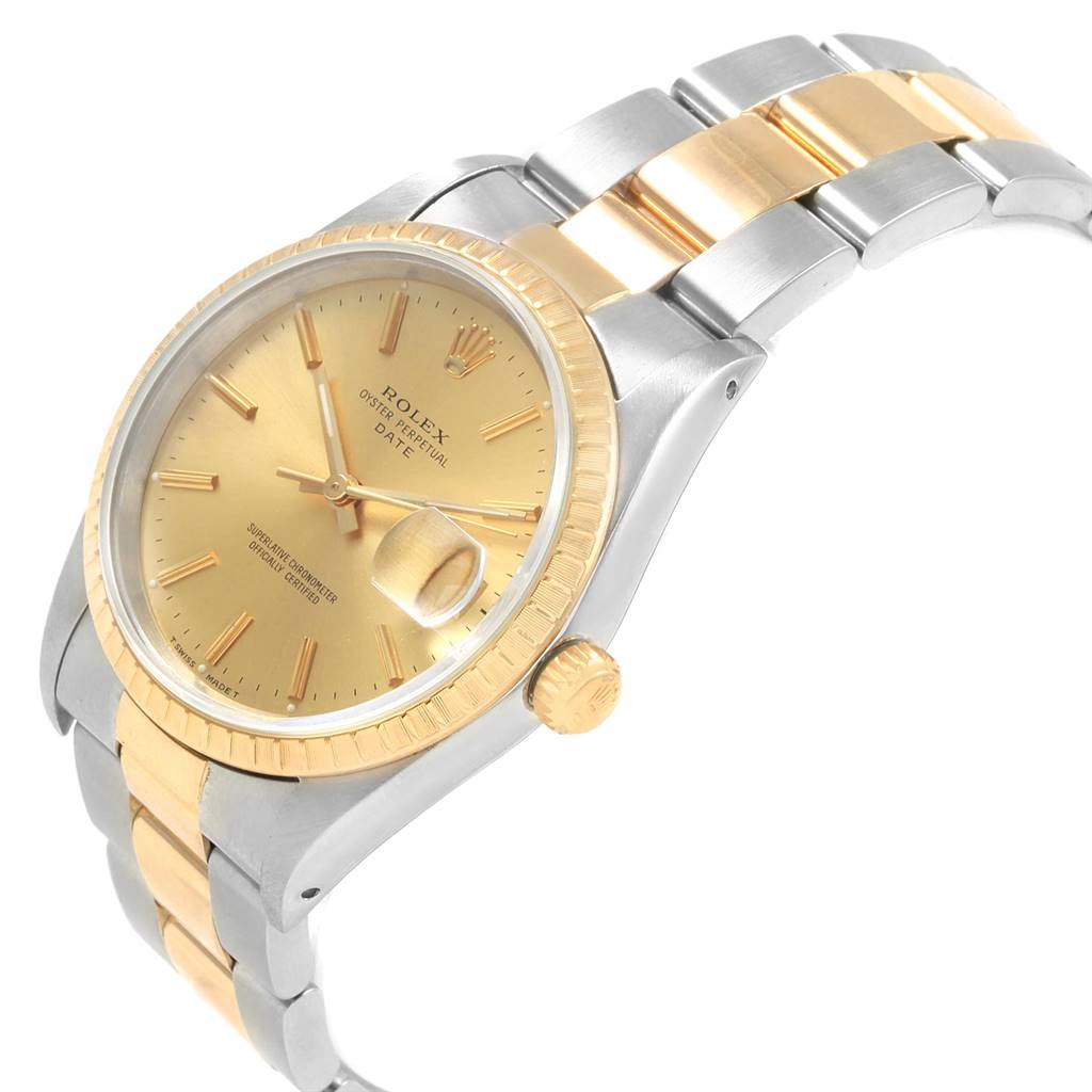 The image shows a gold and silver Rolex Date 15223 Men's Steel and Gold (two tone) Champagne Dial 15223 Men's Steel and Gold (two tone) Champagne Dial model watch at a slight angle, showcasing the dial, bezel, crown, and part of the bracelet.