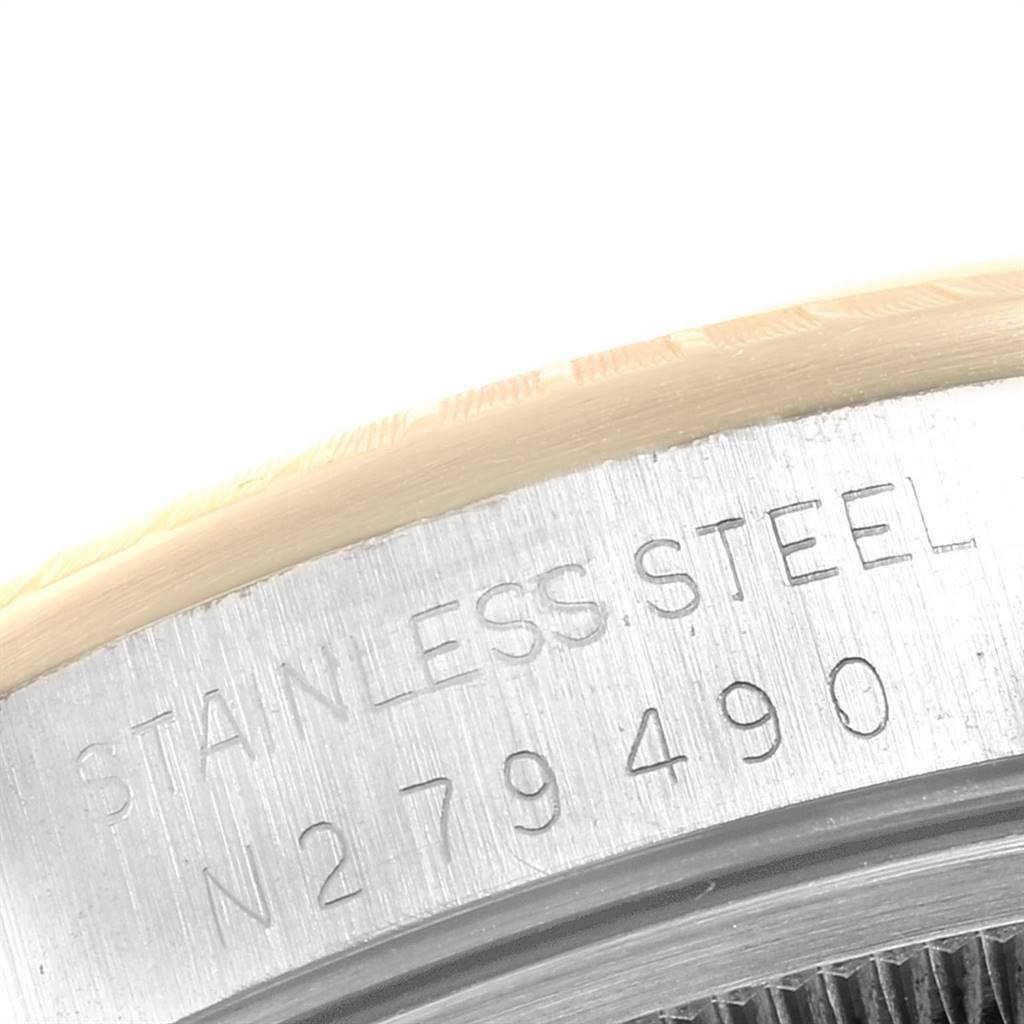 This close-up image shows the side view of the stainless steel casing of the Rolex 15223 Men's Steel and Gold (two tone) White Dial 15223 Men's Steel and Gold (two tone) White Dial Date Mens Steel 18k Yellow Gold White Dial Mens Watch 15223 model.