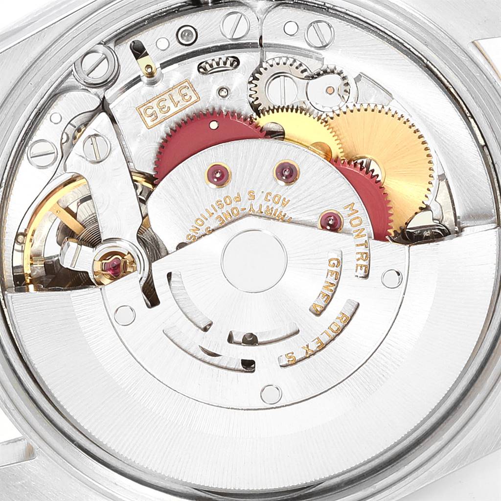 The image shows an internal view of the movement mechanism of the Rolex 15223 Men's Steel and Gold (two tone) White Dial 15223 Men's Steel and Gold (two tone) White Dial Date Mens Steel 18k Yellow Gold White Dial Mens Watch 15223 model.