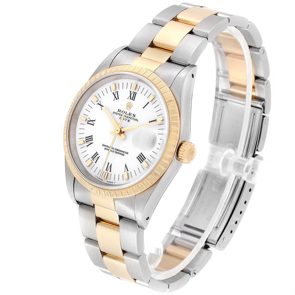 The Rolex 15223 Men's Steel and Gold (two tone) White Dial 15223 Men's Steel and Gold (two tone) White Dial Date Men's Steel 18k Yellow Gold White Dial 15223 model is shown at a tilted angle, revealing the dial, bezel, crown, and bracelet.