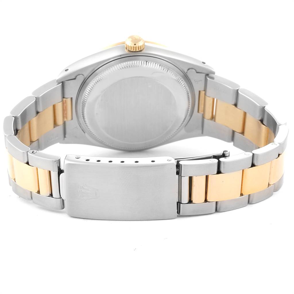 The image shows the back view of a Rolex 15223 Men's Steel and Gold (two tone) White Dial 15223 Men's Steel and Gold (two tone) White Dial Date Men's Steel 18k Yellow Gold White Dial Men's Watch 15223, highlighting the clasp and bracelet.