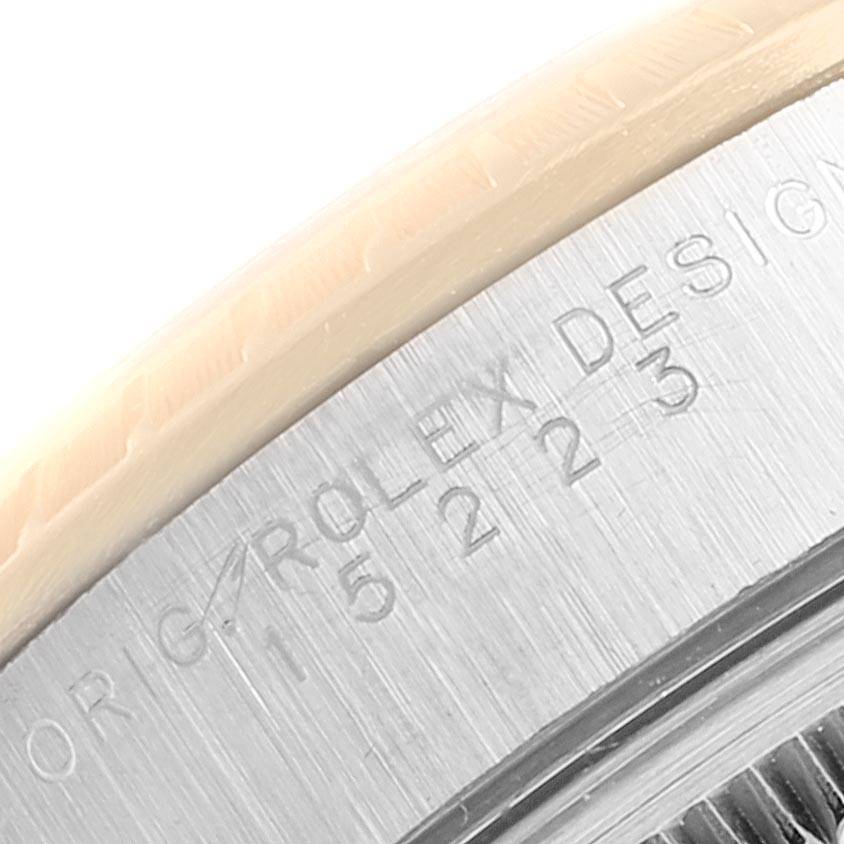 This close-up image shows the engraved model number "15223" on the case of a Rolex Date 15223 Men's Steel and Gold (two tone) Blue Dial 15223 Men's Steel and Gold (two tone) Blue Dial watch.