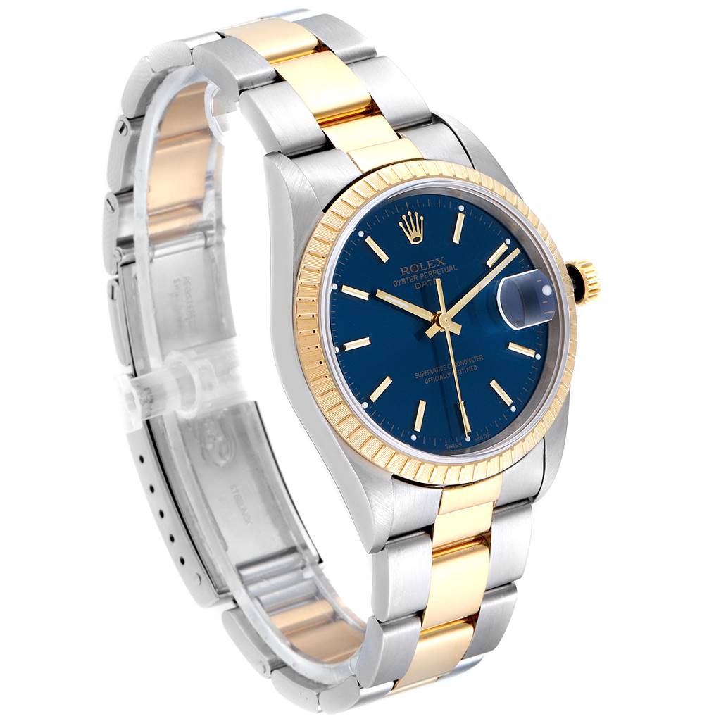 The image shows a Rolex Date 15223 Men's Steel and Gold (two tone) Blue Dial 15223 Men's Steel and Gold (two tone) Blue Dial model watch, featuring the dial, bezel, crown, and bracelet in a side angle view.