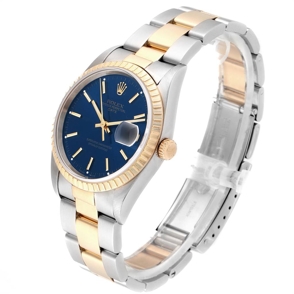 The image shows a Rolex Date 15223 Men's Steel and Gold (two tone) Blue Dial 15223 Men's Steel and Gold (two tone) Blue Dial model watch at a three-quarter angle, highlighting its face, bezel, crown, and bracelet.