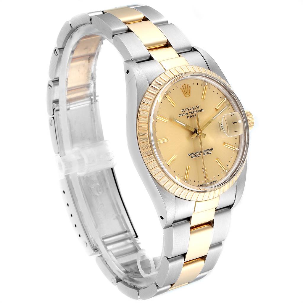 The image shows a Rolex Date 15053 Men's Steel and Gold (two tone) Champagne Dial 15053 Men's Steel and Gold (two tone) Champagne Dial model watch with a two-tone band and a fluted bezel, viewed from an angled front perspective.