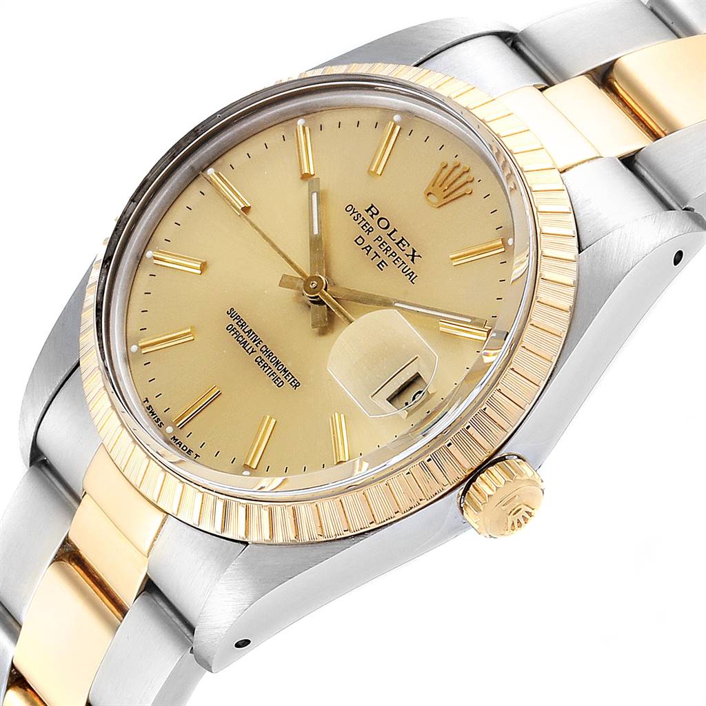 This image shows a Rolex Date 15053 Men's Steel and Gold (two tone) Champagne Dial 15053 Men's Steel and Gold (two tone) Champagne Dial model watch at an angled view, displaying the dial, crown, and part of the bracelet.
