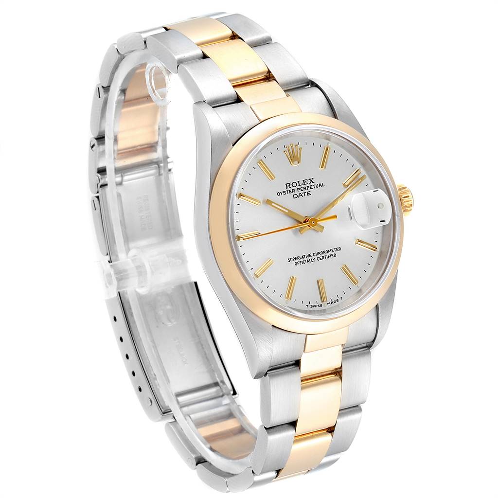 This image shows a side angle of a Rolex Date 15203 Men's Steel and Gold (two tone) Silver Dial 15203 Men's Steel and Gold (two tone) Silver Dial model watch, highlighting the face, bezel, and two-tone bracelet.