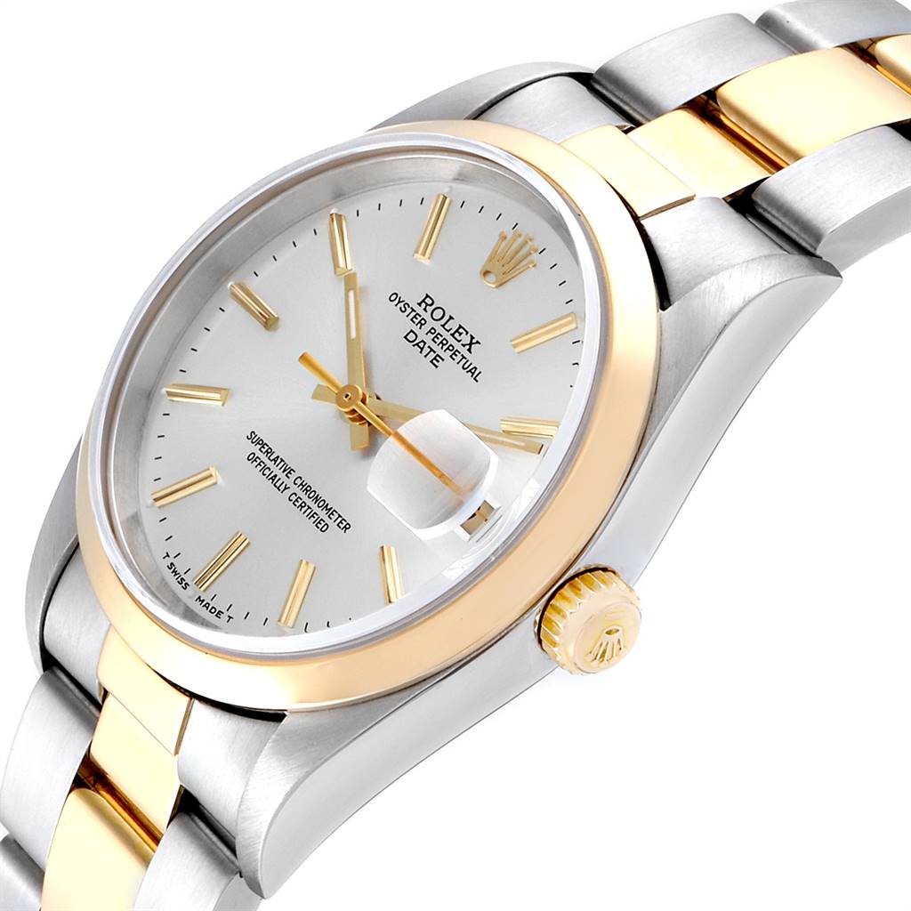 This image shows a Rolex Date 15203 Men's Steel and Gold (two tone) Silver Dial 15203 Men's Steel and Gold (two tone) Silver Dial model watch at an angled view, highlighting the dial, crown, and bracelet.