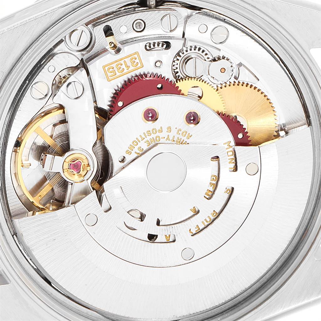 This image shows the internal mechanism of a Rolex Date 15210 Men's Stainless Steel White Dial 15210 Men's Stainless Steel White Dial watch model, including gears and the rotor.