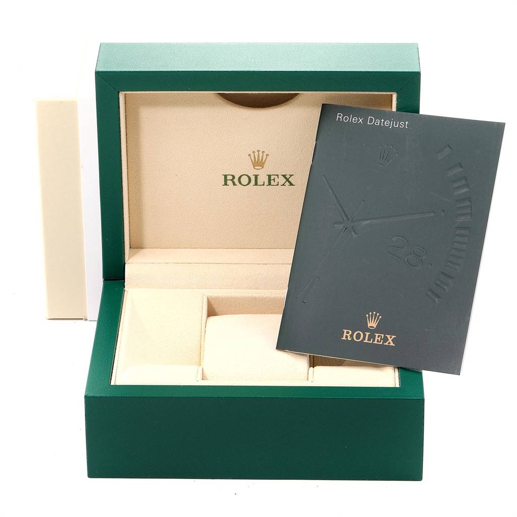 The image shows a Rolex Date 115234 Men's Stainless Steel Black Dial 115234 Men's Stainless Steel Black Dial model watch box and accompanying booklet, taken from a front angle.