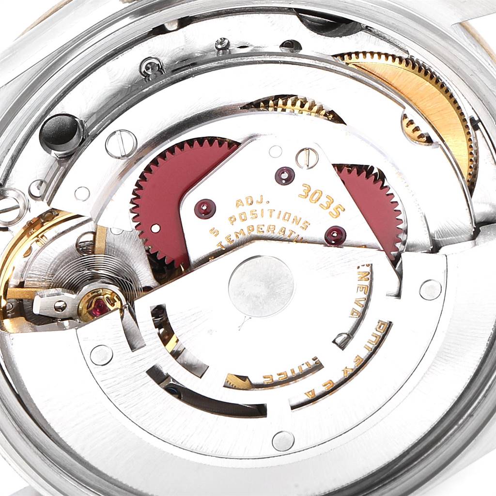 This image shows a close-up view of the internal movement mechanism of a Rolex Date 15053 Men's Steel and Gold (two tone) Black Dial 15053 Men's Steel and Gold (two tone) Black Dial model watch.
