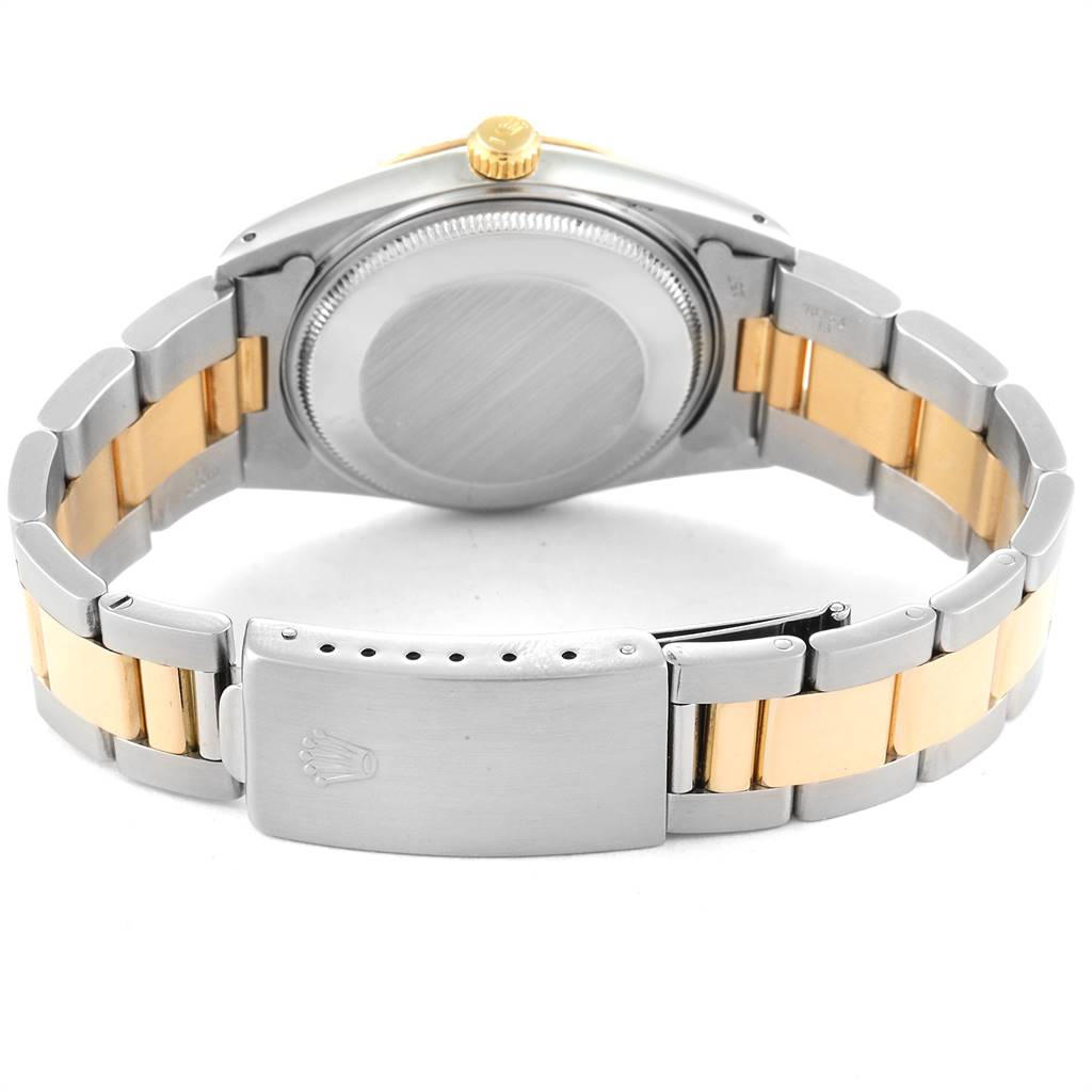 This image shows the backside and bracelet of the Rolex Date 15053 Men's Steel and Gold (two tone) Black Dial 15053 Men's Steel and Gold (two tone) Black Dial model watch, highlighting the clasp and case back.