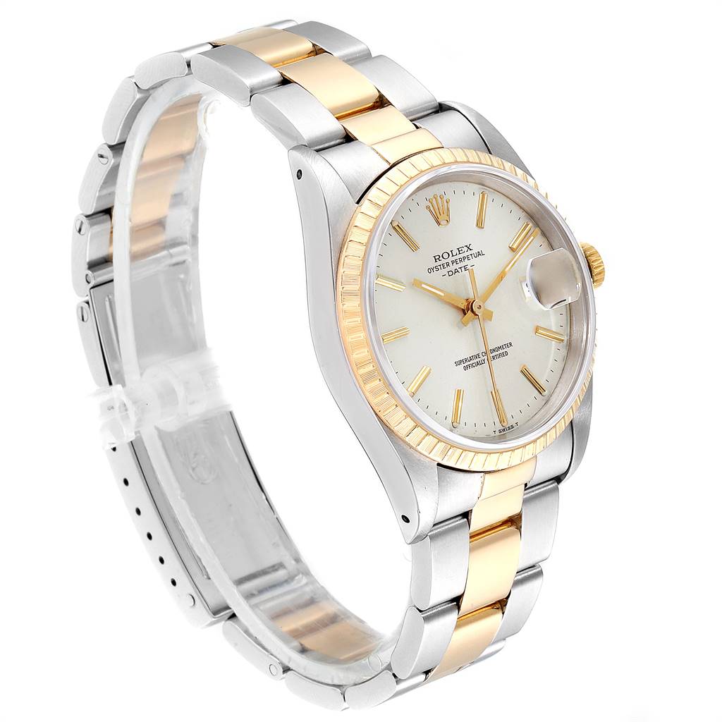 This image shows a side-angle view of a Rolex Date 15223 Men's Steel and Gold (two tone) Silver Dial 15223 Men's Steel and Gold (two tone) Silver Dial model watch, highlighting the face, case, crown, and bracelet.