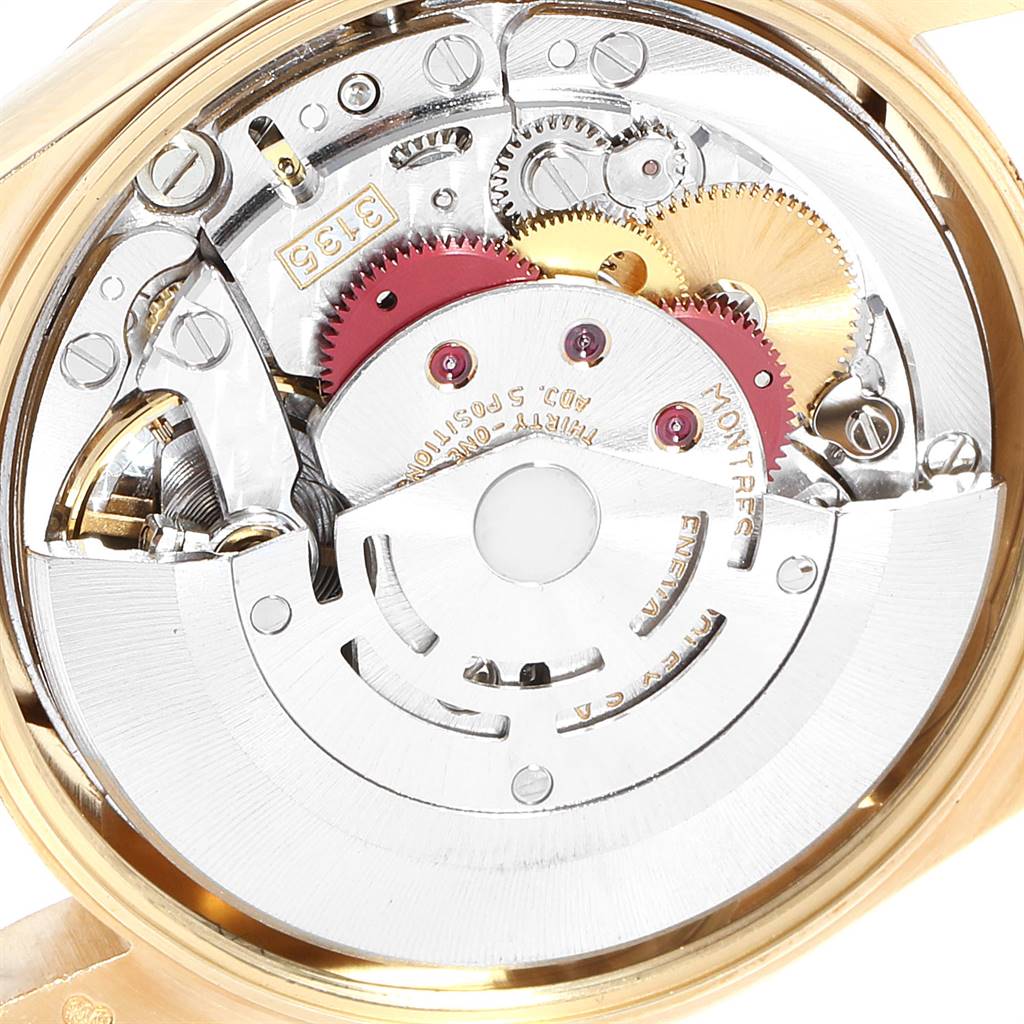This image shows the internal mechanical movement of the Rolex Date 15238 Men's Yellow Gold White Dial 15238 Men's Yellow Gold White Dial model watch, focusing on gears and intricate components.