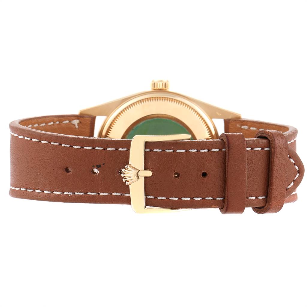 The image shows a rear angle of the Rolex Date 15238 Men's Yellow Gold White Dial 15238 Men's Yellow Gold White Dial watch, highlighting its brown leather strap and gold buckle.