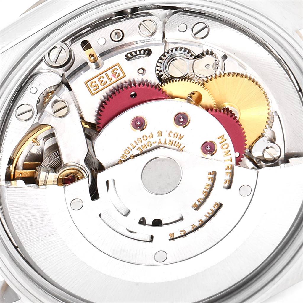 This image shows the movement and inner mechanical parts of a Rolex Date 15203 Men's Steel and Gold (two tone) White Dial 15203 Men's Steel and Gold (two tone) White Dial model watch, viewed from the back.