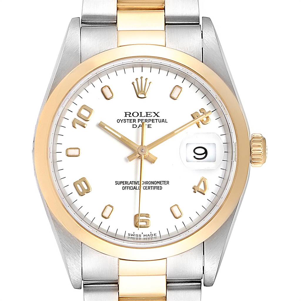 The image shows a front view of a Rolex Date 15203 Men's Steel and Gold (two tone) White Dial 15203 Men's Steel and Gold (two tone) White Dial Oyster Perpetual watch, highlighting the dial, bezel, hands, and part of the bracelet.