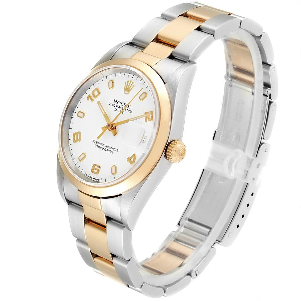 This image shows a Rolex Date 15203 Men's Steel and Gold (two tone) White Dial 15203 Men's Steel and Gold (two tone) White Dial model watch from a slightly angled front view, highlighting its dial, bezel, bracelet, and crown.