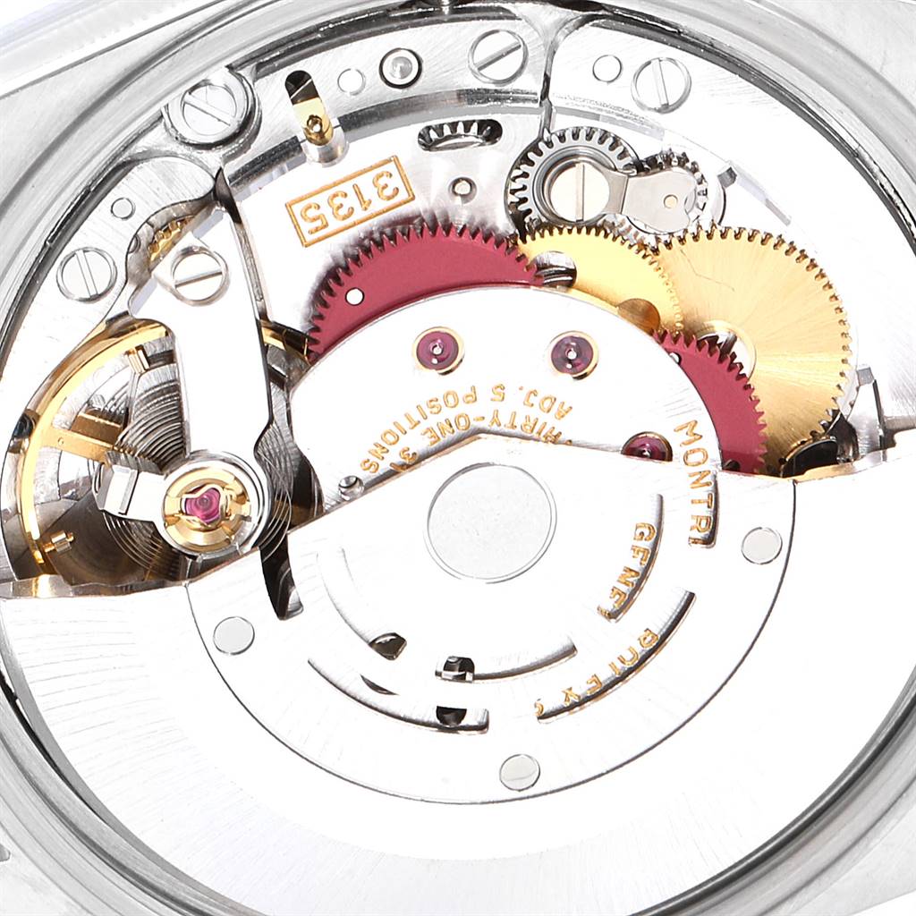 The image shows the internal mechanism of the Rolex Date 15203 Men's Steel and Gold (two tone) Silver Dial 15203 Men's Steel and Gold (two tone) Silver Dial model watch from a close-up angle.