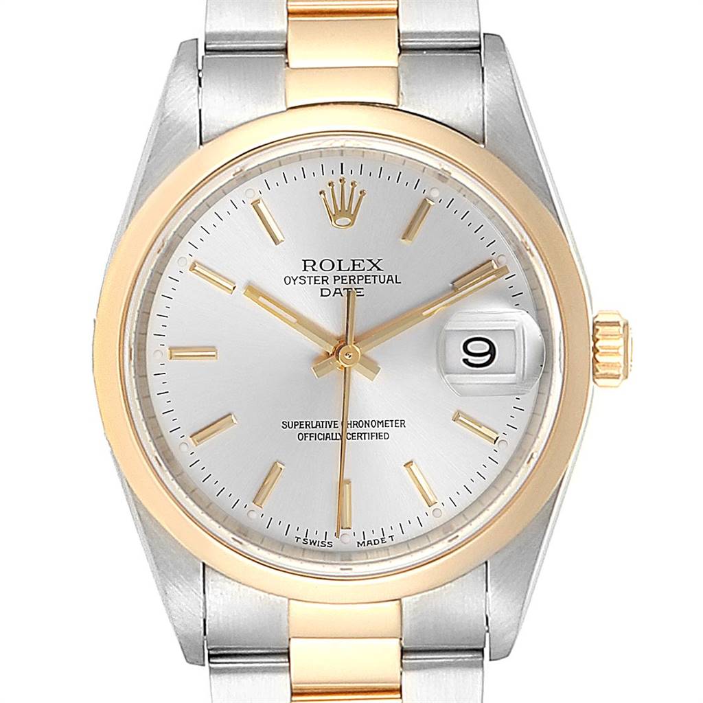 This image shows a front view of a Rolex Oyster Perpetual Date watch, highlighting its two-toned band and date window.
