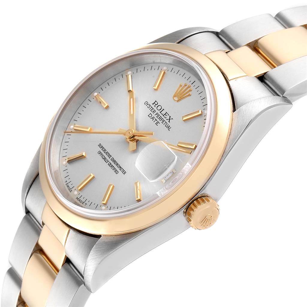 The image shows a side and top angle of the Rolex Date 15203 Men's Steel and Gold (two tone) Silver Dial 15203 Men's Steel and Gold (two tone) Silver Dial watch, displaying the face, crown, and part of the bracelet.