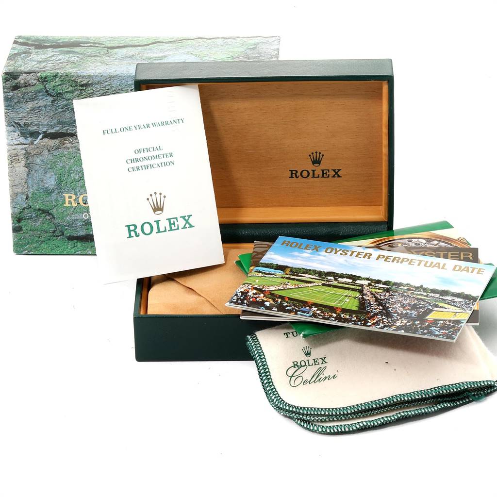 The image shows an open Rolex Date 15203 Men's Steel and Gold (two tone) Silver Dial 15203 Men's Steel and Gold (two tone) Silver Dial model box with warranty cards, a booklet, and a polishing cloth.